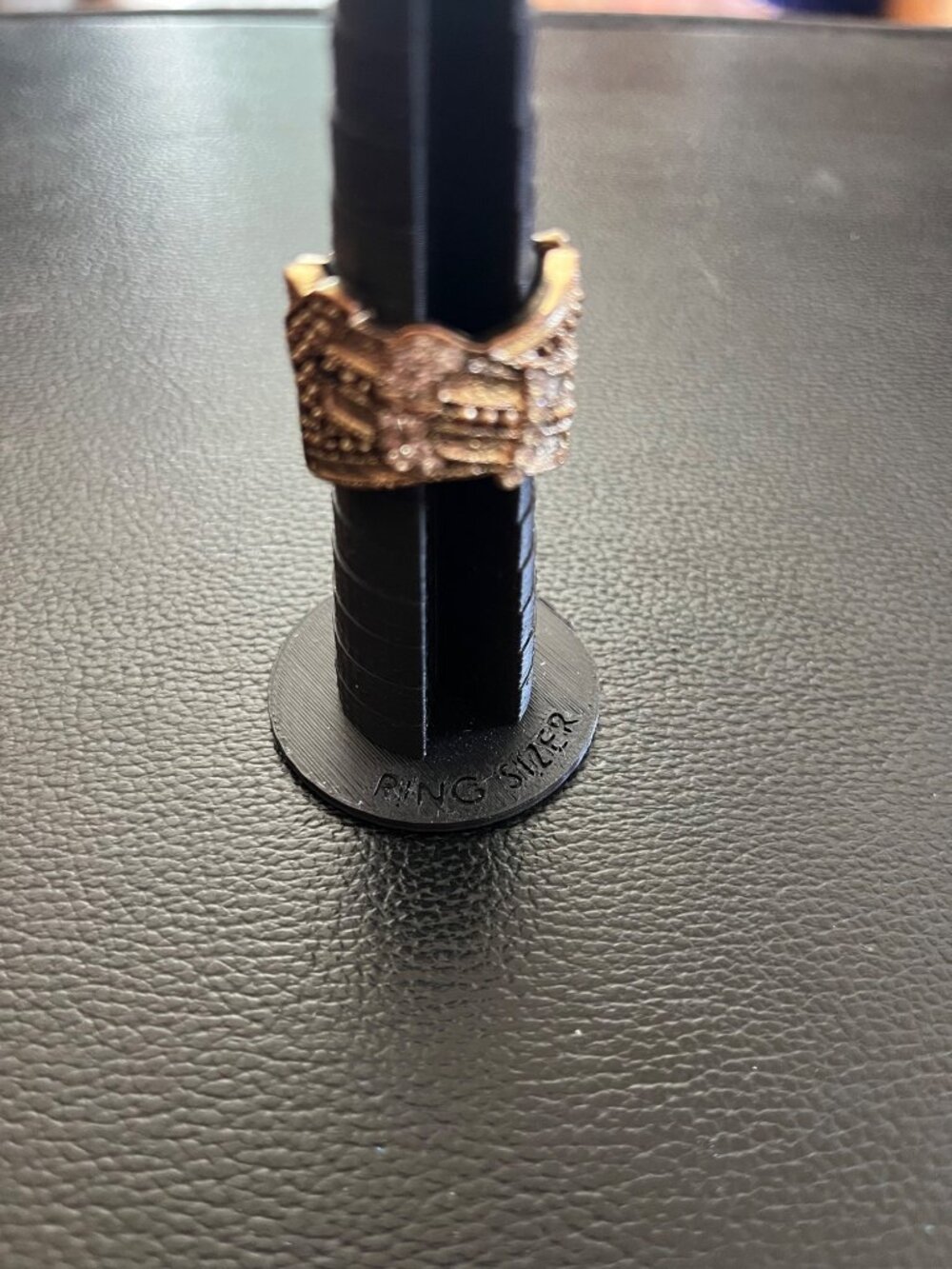 Vintage Gold-Tone Skeleton Hand Ring With Adjustable Band And Textured Design